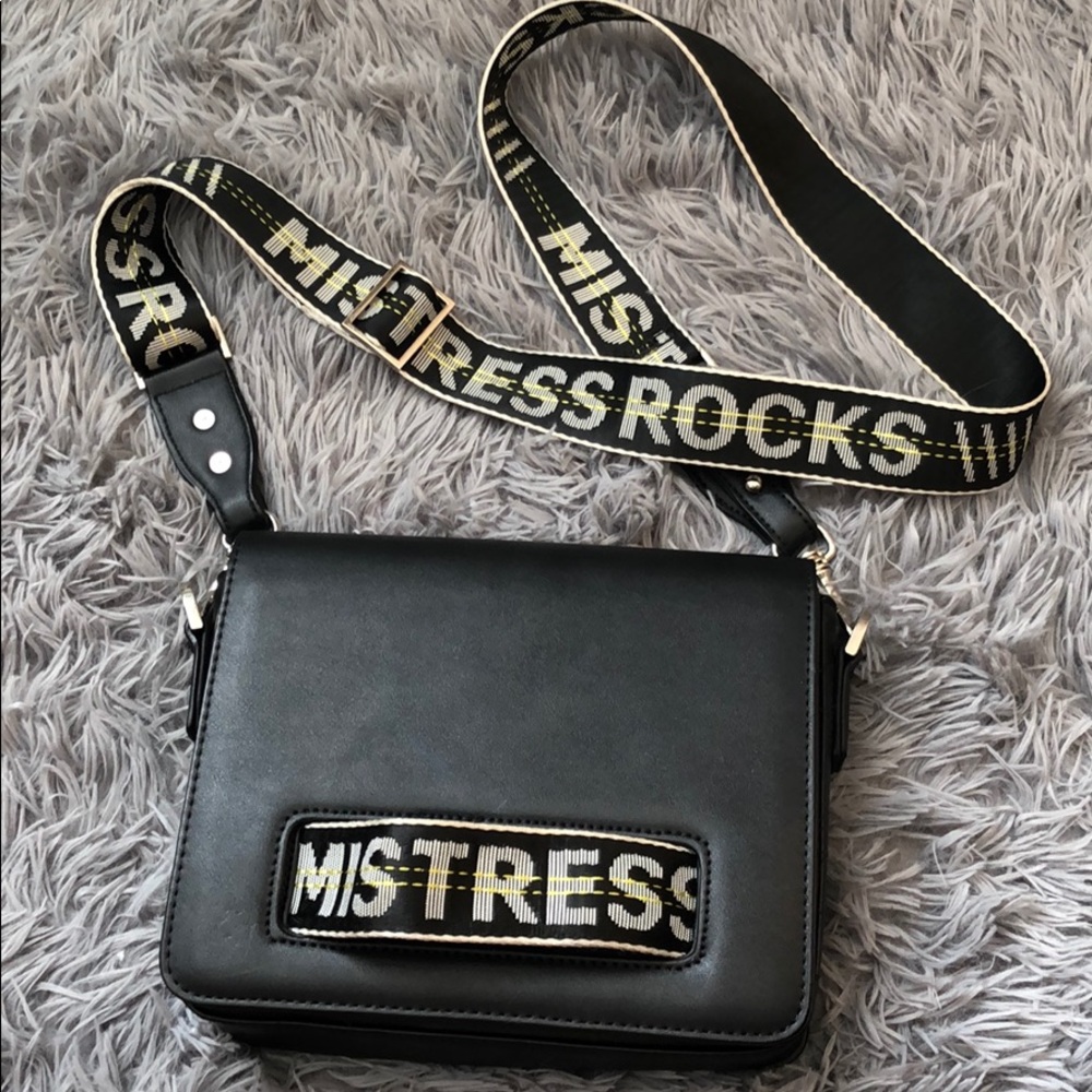 Mistress rocks LA purse